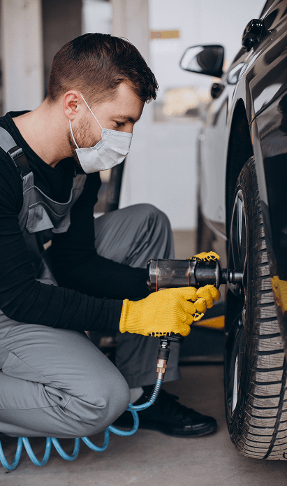 Mechanic working on a tire
